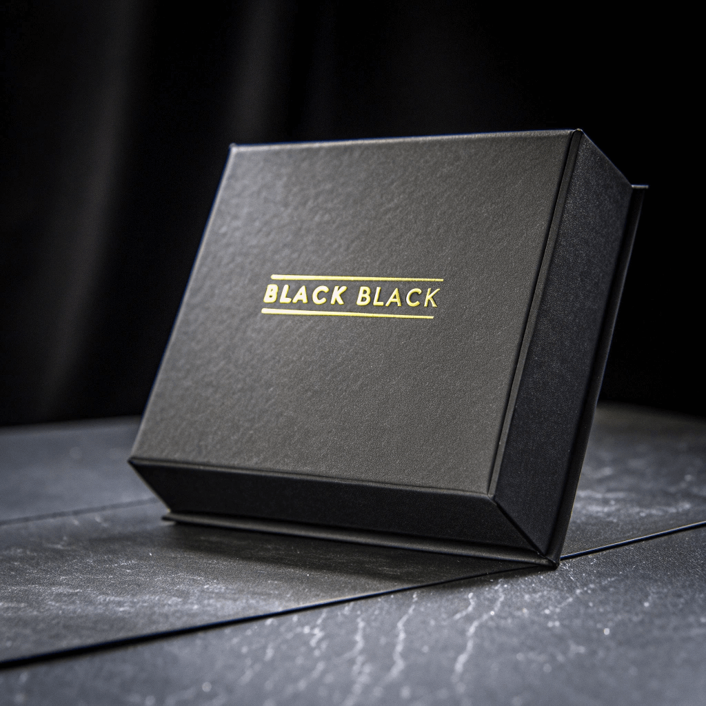 Premium black rigid box featuring gold foil stamping and glossy spot UV details.